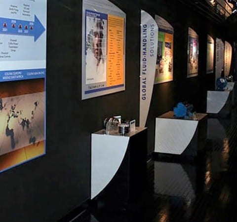 Custom informational wall banners with branded graphics and interactive displays of artifacts in Monroe, NC
