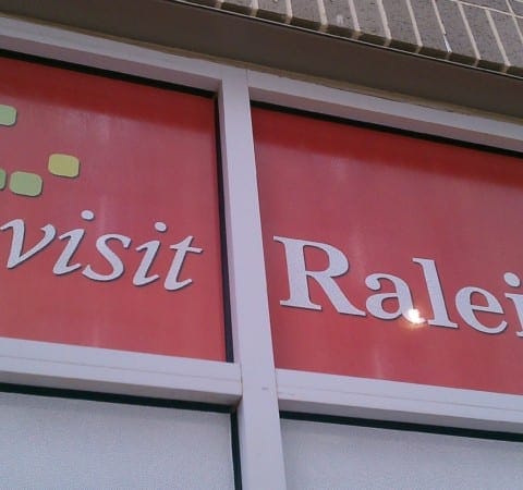 Perforated high quality custom branded window graphics by Holt Environments