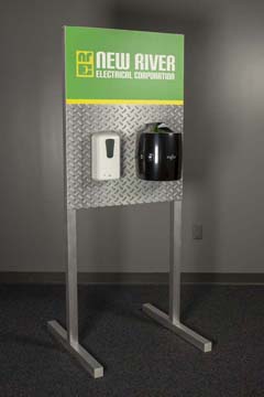 Freestanding branded hygiene station with hand sanitizer and wipes